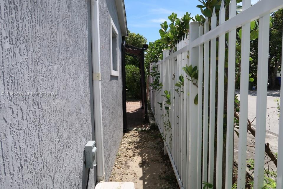 1336 Northwest 38th Street, Unit 1 Miami, FL 33142 - Photo 20 of 33 a view of a corridor