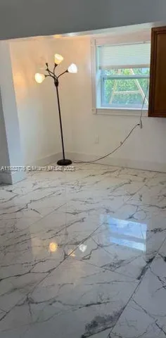 a view of wooden floor and a sink