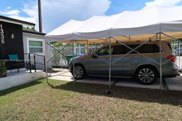a car parked in front of a house