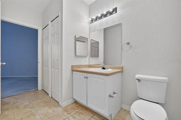a bathroom with a sink toilet tub and shower