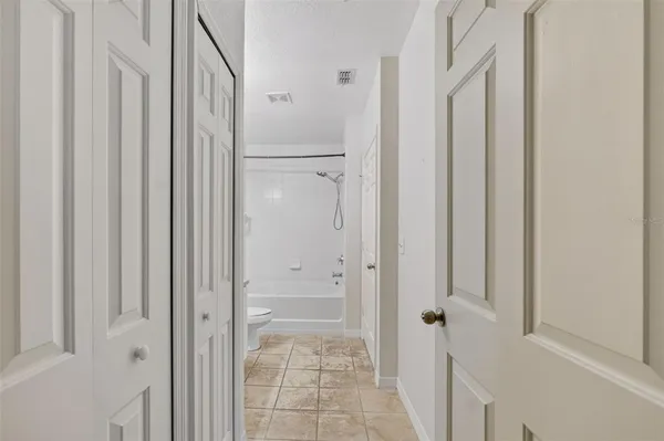 a view of a bathroom with toilet