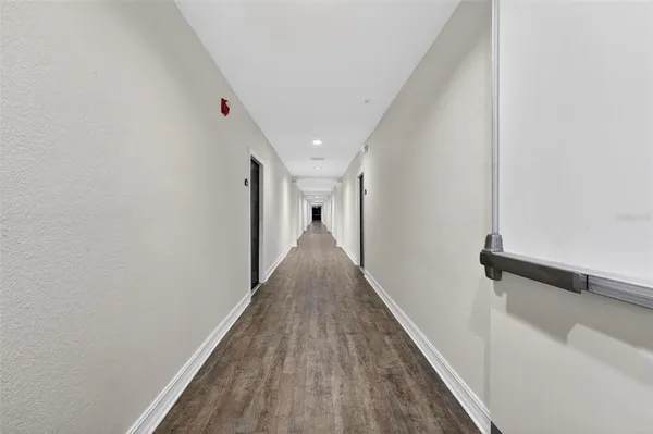 a swimming pool with outdoor seating and yard