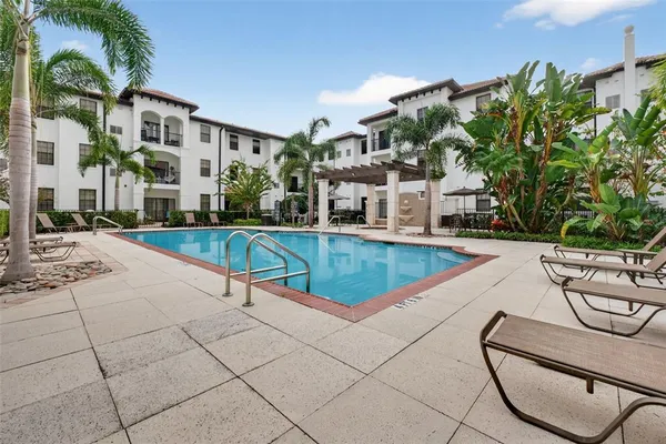 a view of a house with a swimming pool