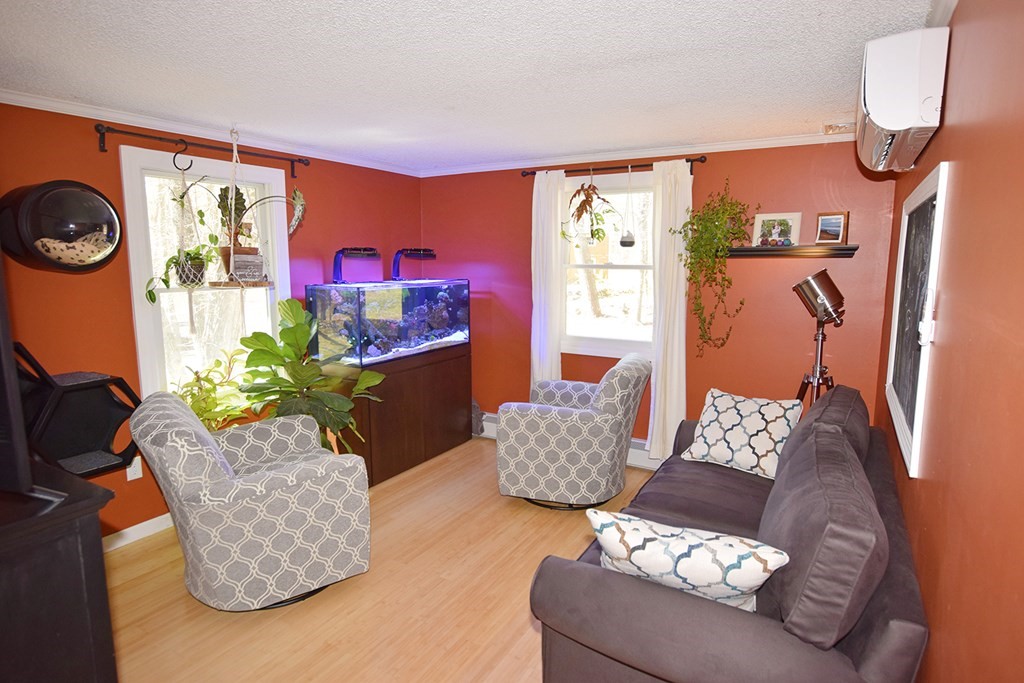 173 Hardwick Road Petersham, MA 01366 - Photo 13 of 37 a living room with furniture and a couch