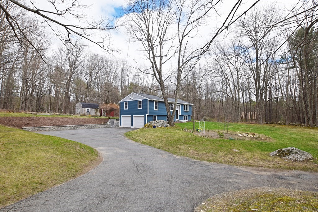 173 Hardwick Road Petersham, MA 01366 - Photo 35 of 37 a front view of a house with garden