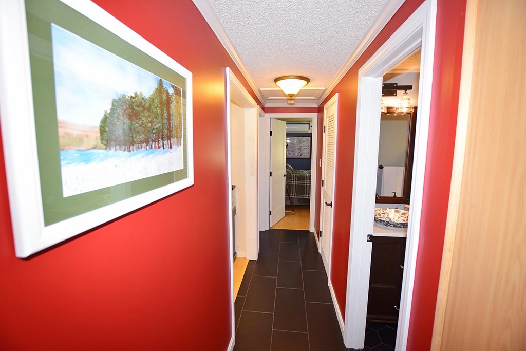 173 Hardwick Road Petersham, MA 01366 - Photo 10 of 37 a hallway with furniture and a large window