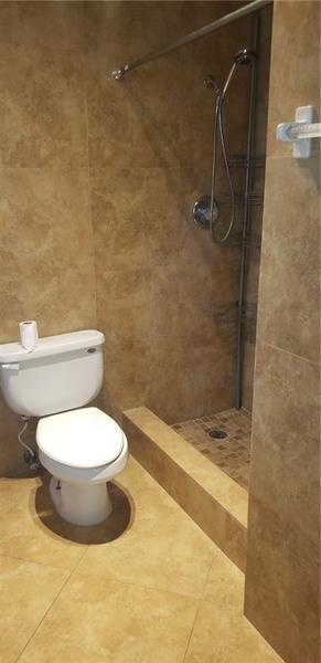 98 Seminole Lane Boca Raton, FL 33487 - Photo 21 of 42 a bathroom with a toilet and a shower