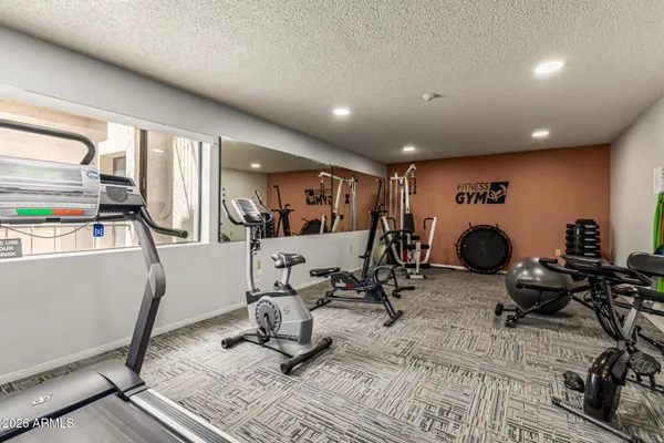 a view of a room with gym equipment