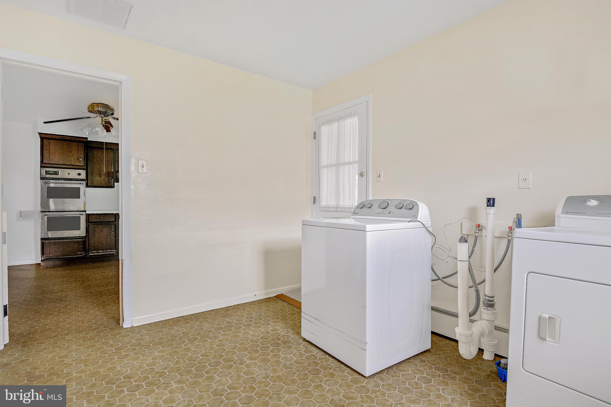 821 Woodberry Road York, PA 17403 - Photo 12 of 25 first floor laundry off kitchen