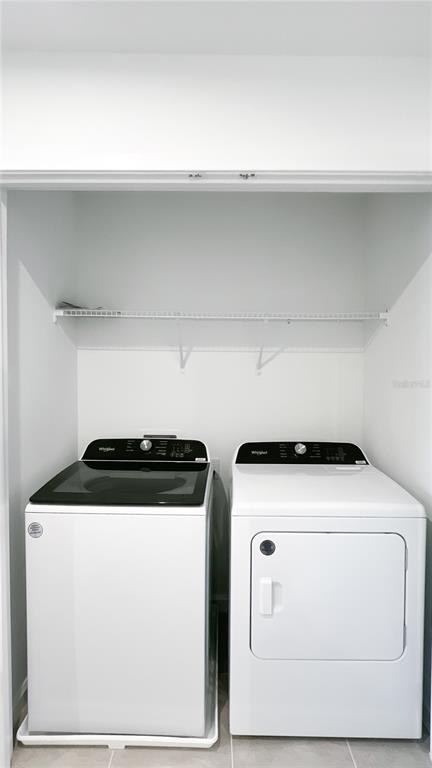 4268 Sadler Road Apopka, FL 32712 - Photo 14 of 28 a utility room with dryer and washer