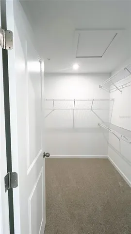 a view of a room with racks on the wall