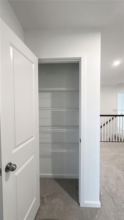 4268 Sadler Road Apopka, FL 32712 - Photo 27 of 28 a view of a walk in closet