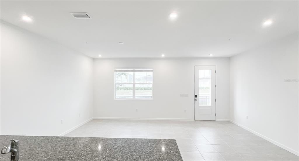 4268 Sadler Road Apopka, FL 32712 - Photo 10 of 28 an empty room with windows