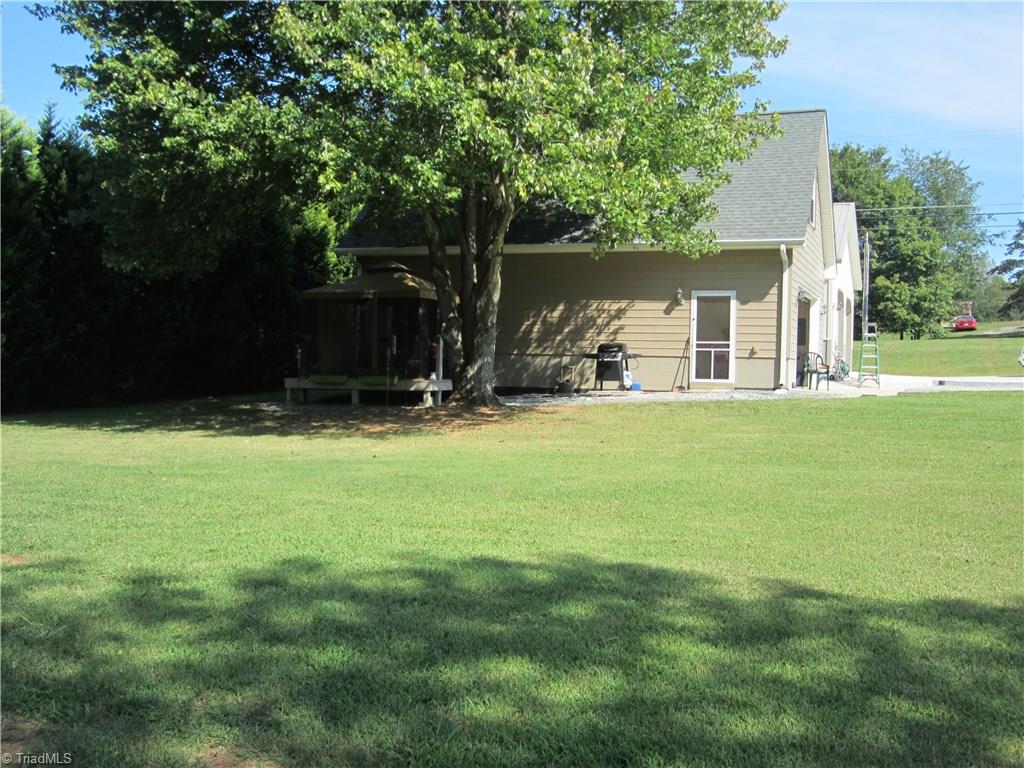 2630 Riverview Road Lexington, NC 27292 - Photo 3 of 18 Living area & gazebo under the shade trees