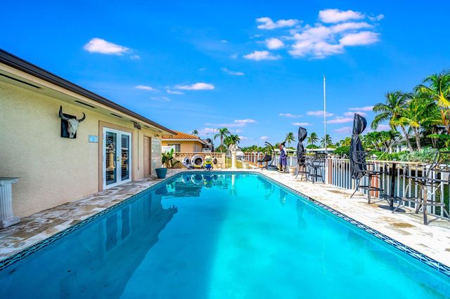 a view of a livingroom with furniture and gym equipment
