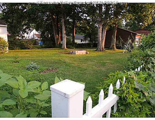 Exterior Back. Fenced back yard great for children or pets.
