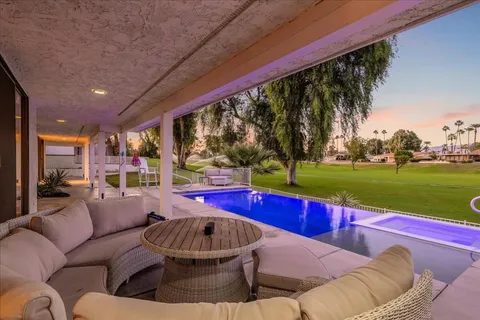 a view of a house with a big yard