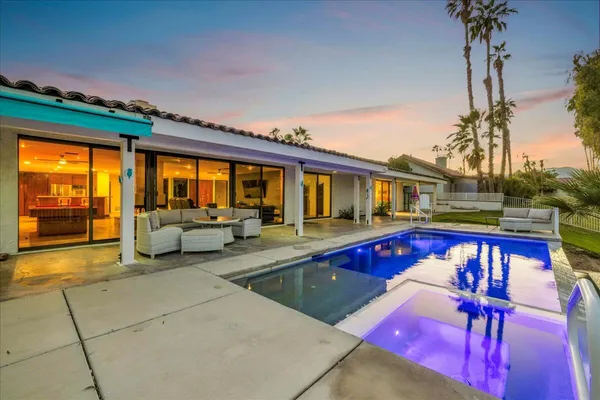 a view of a house with a big yard