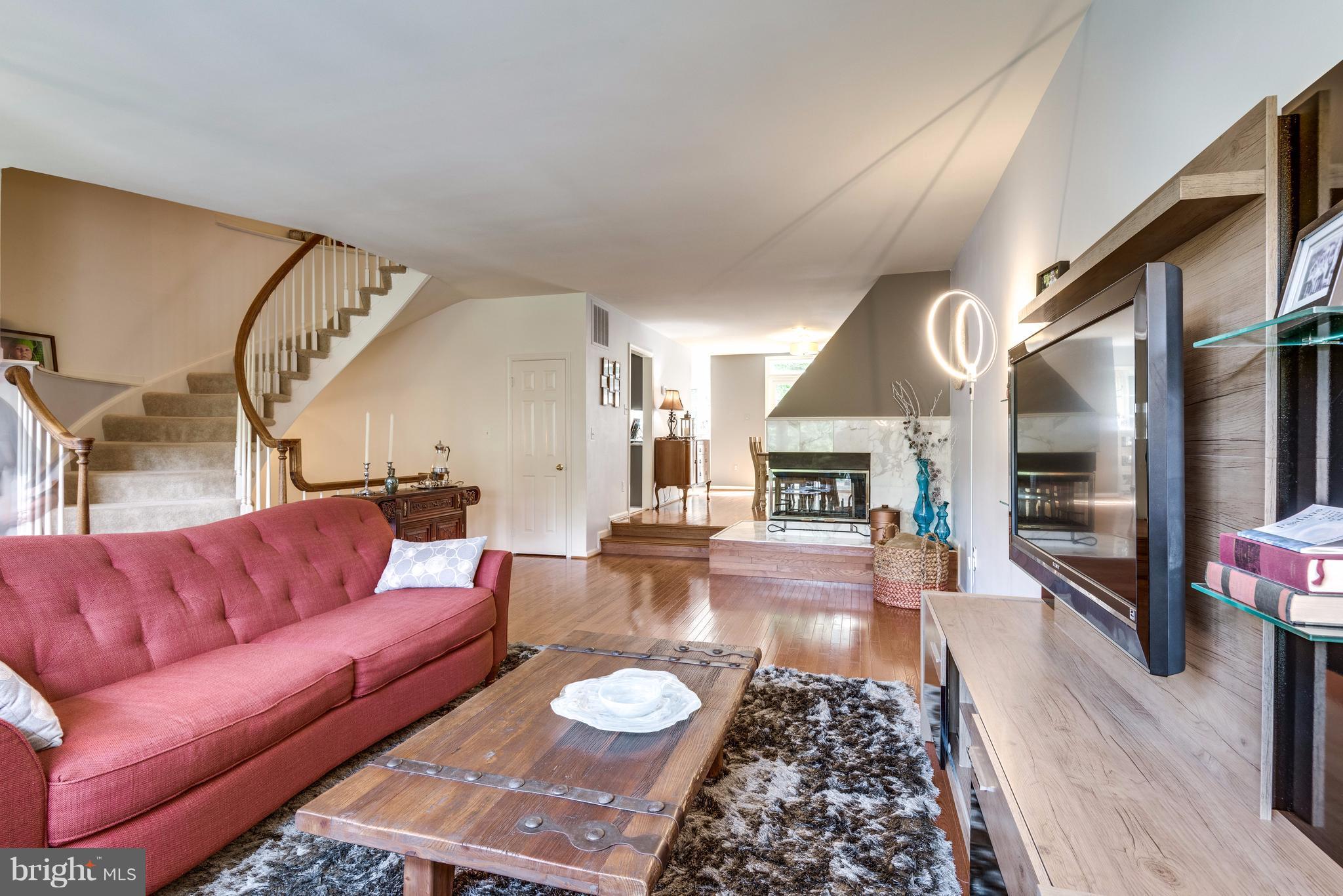 1363 Heritage Oak Way Reston, VA 20194 - Photo 7 of 30 Stunning curved staircase to the bedroom level