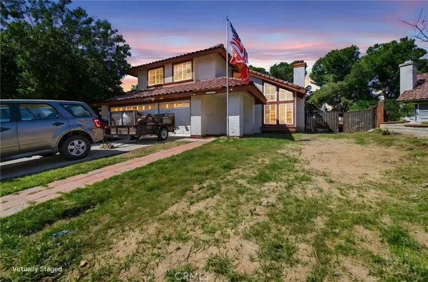 a view of a house with a patio