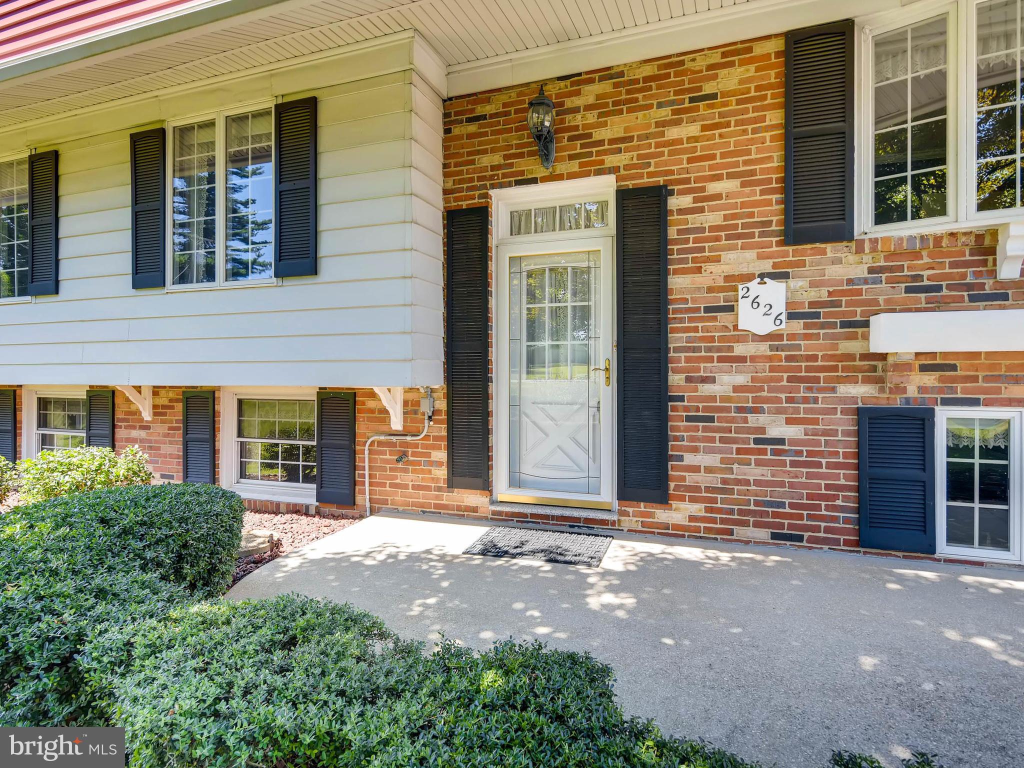 2626 Pleasantville Road Fallston, MD 21047 - Photo 2 of 29 a view of a brick house with a large windows