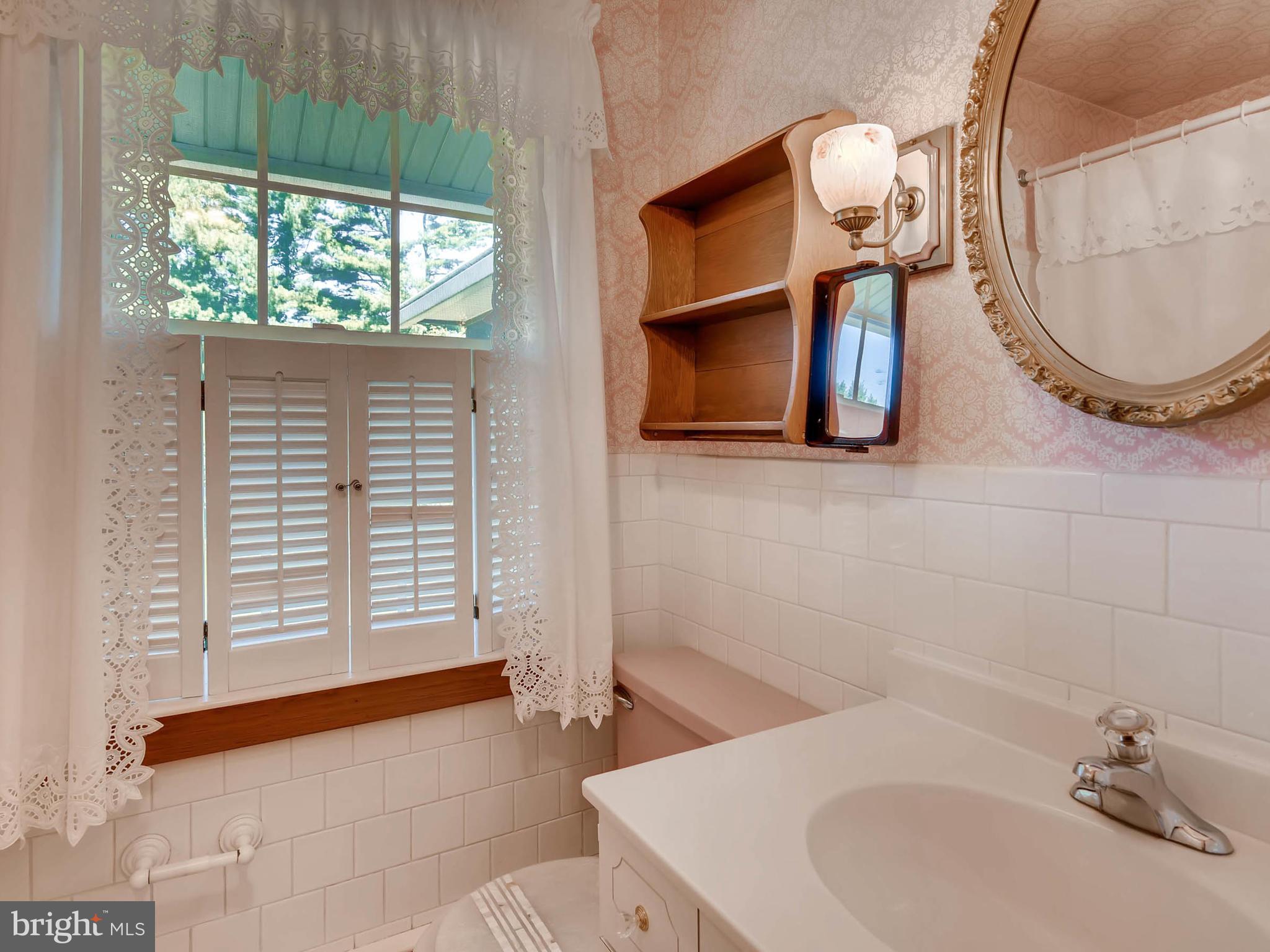 2626 Pleasantville Road Fallston, MD 21047 - Photo 14 of 29 a bathroom with a sink and a mirror