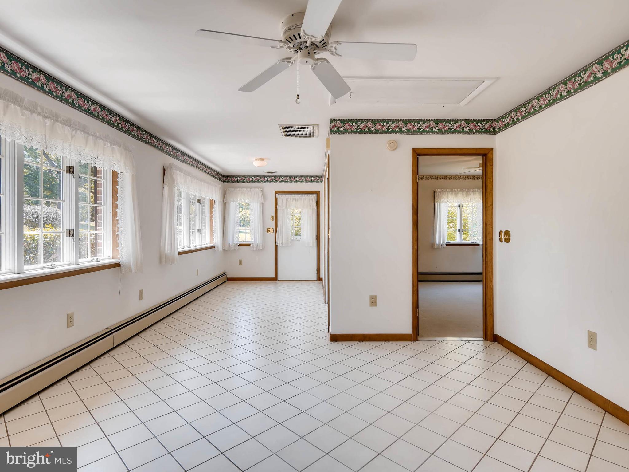 2626 Pleasantville Road Fallston, MD 21047 - Photo 20 of 29 wooden floor in an empty room with a window
