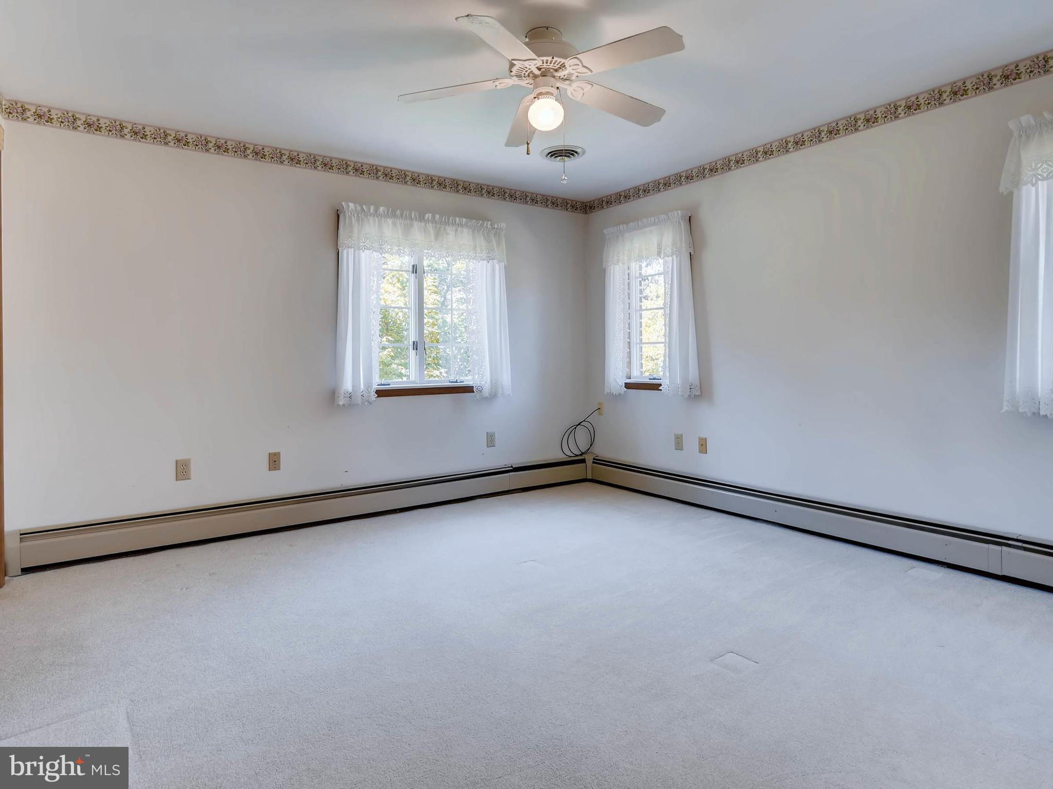 2626 Pleasantville Road Fallston, MD 21047 - Photo 21 of 29 a view of a room with window and ceiling fan