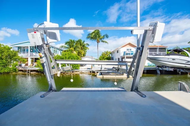a view of entryway dining room and hall way with furniture