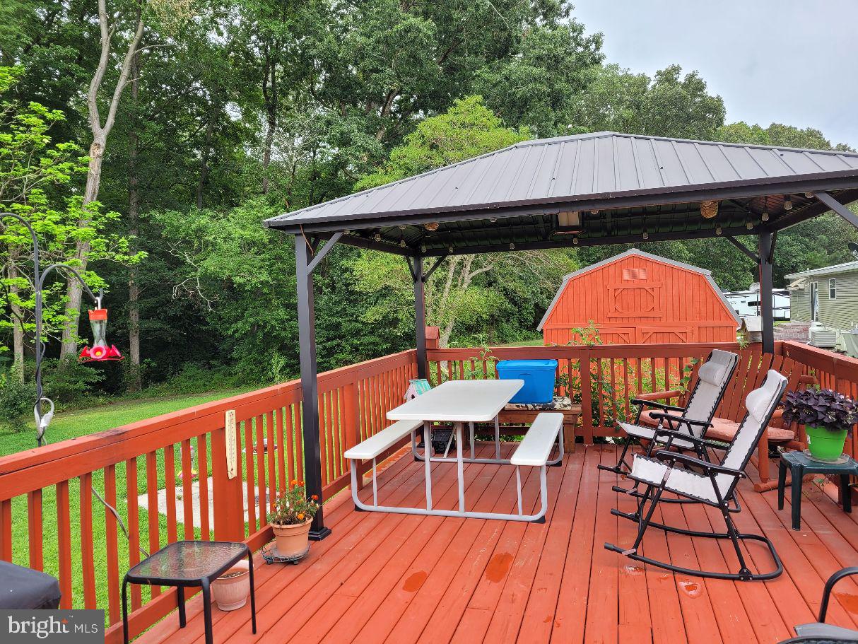 5809 Homestead Street Salisbury, MD 21801 - Photo 18 of 33 12x24 deck, Gazabo w/metal roof & loghting