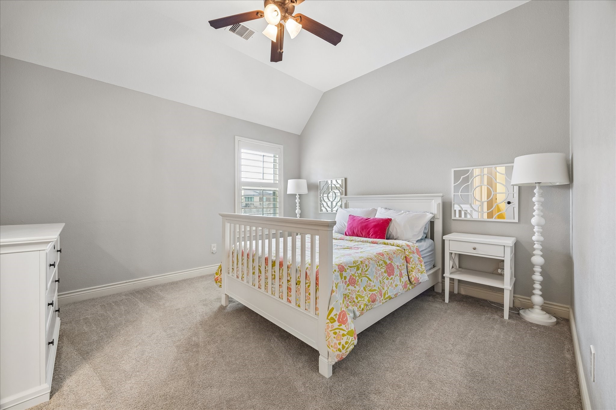 1616 Hewitt Drive Houston, TX 77018 - Photo 19 of 44 Bright bedroom with large window and plush carpet provides a comfortable space for family or guests.