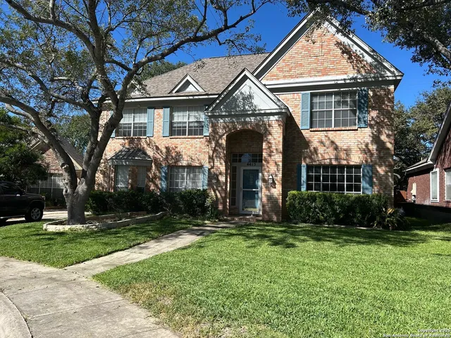 front view of a house and a yard