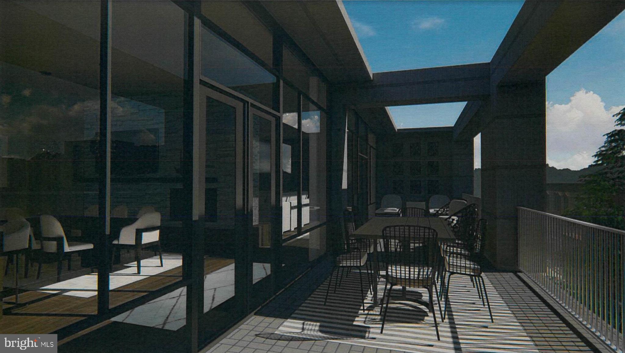 101 North Queen Street, Unit PH407 Lancaster, PA 17603 - Photo 9 of 17 a balcony with chairs and wooden floor