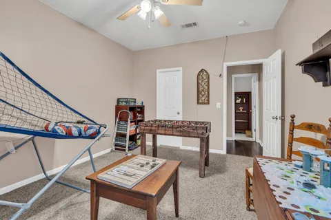 a view of a livingroom with furniture and window