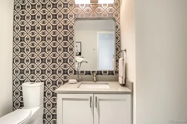 a bathroom with a sink and a toilet