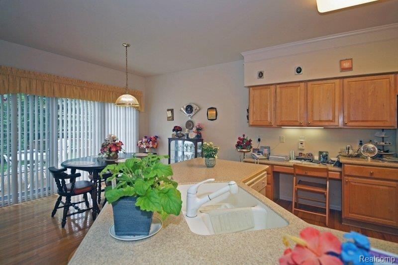 11211 Pinehurst Road, Unit 11 Plymouth, MI 48170 - Photo 9 of 14 Kitchen & BF