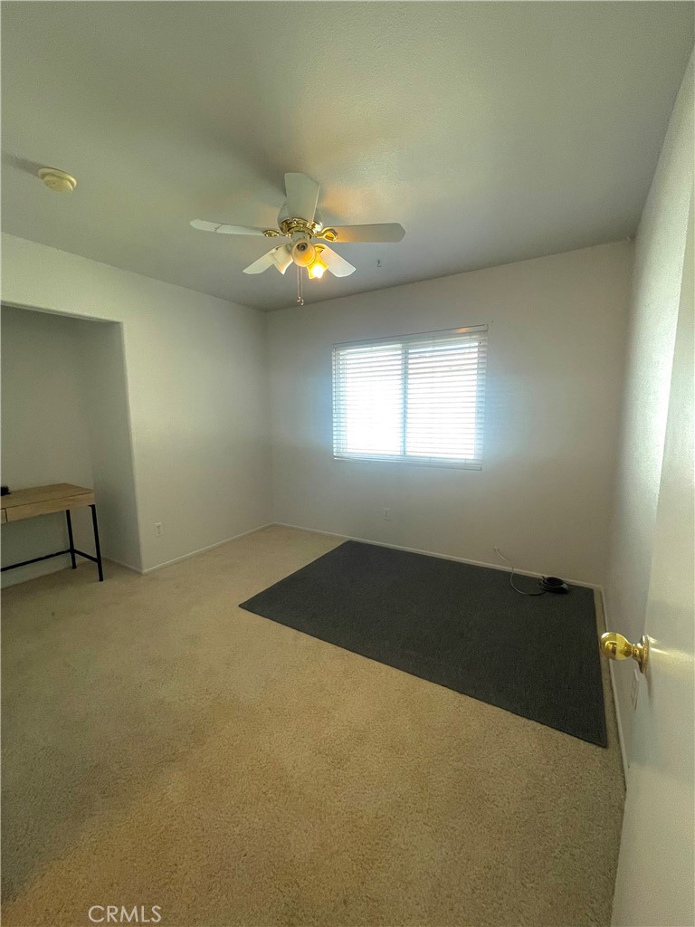 965 Hardwick Avenue Beaumont, CA 92223 - Photo 15 of 19 a view of an empty room and window