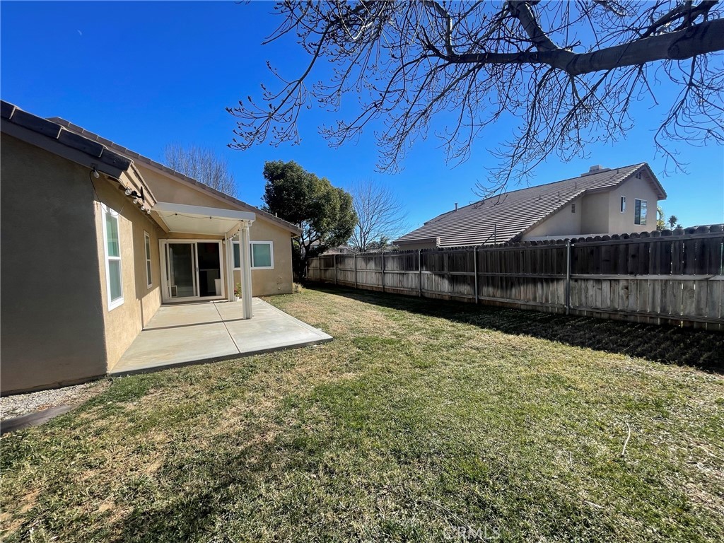 965 Hardwick Avenue Beaumont, CA 92223 - Photo 17 of 19 a view of backyard with cabin