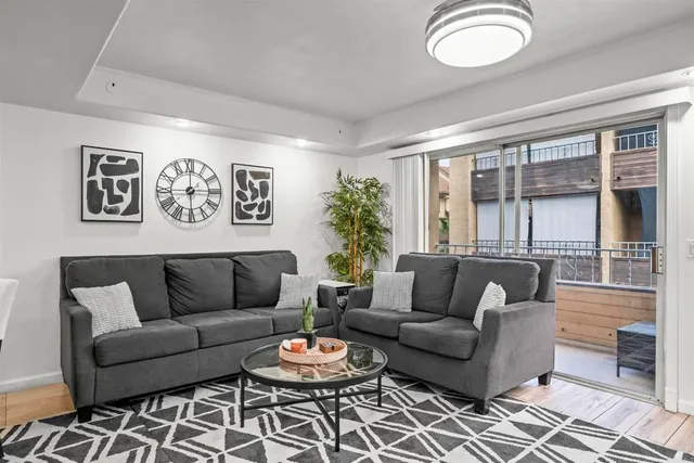a kitchen with stainless steel appliances granite countertop a refrigerator and a stove