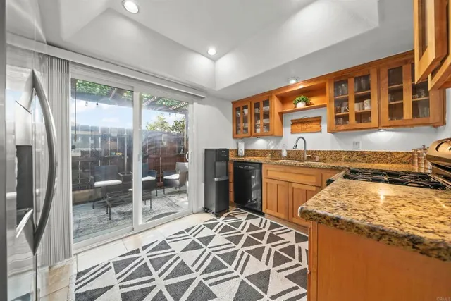 a bedroom with furniture and a book shelf