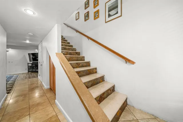 a view of a car park in front of house