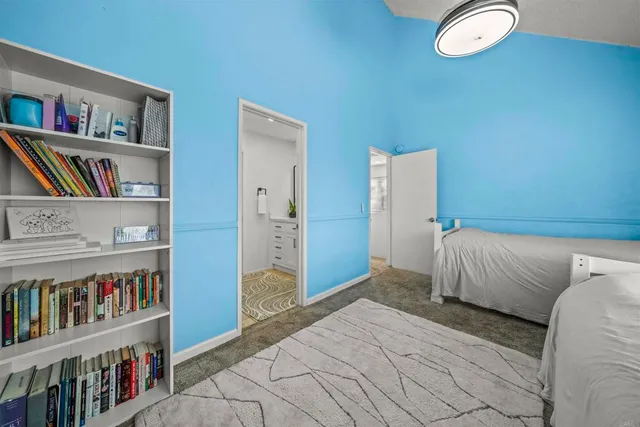 a view of a balcony with wooden floor