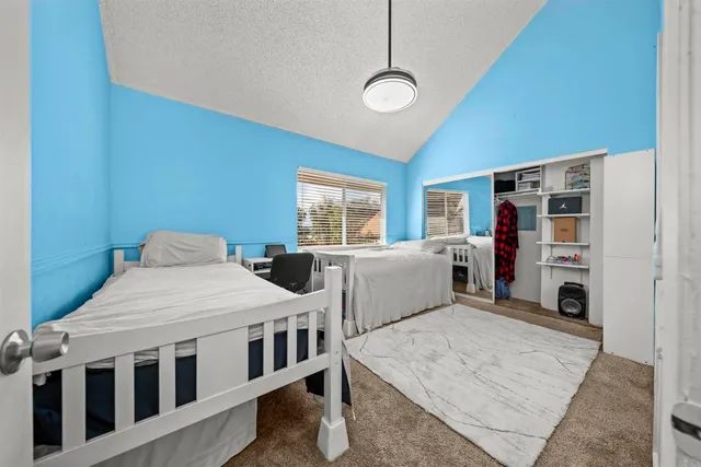 a view of a pathway with a yard