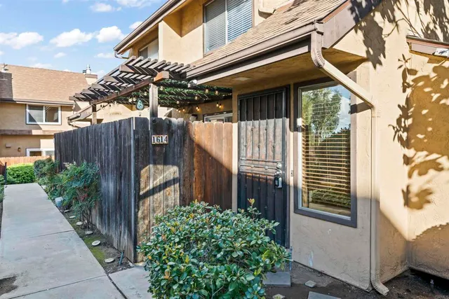 a view of a swimming pool with chairs