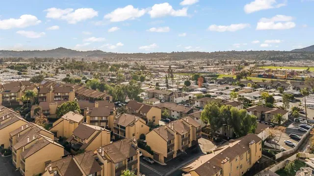 an aerial view of a city with lots of residential buildings