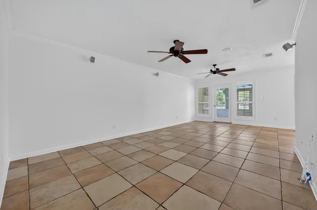 a view of a room with a large window