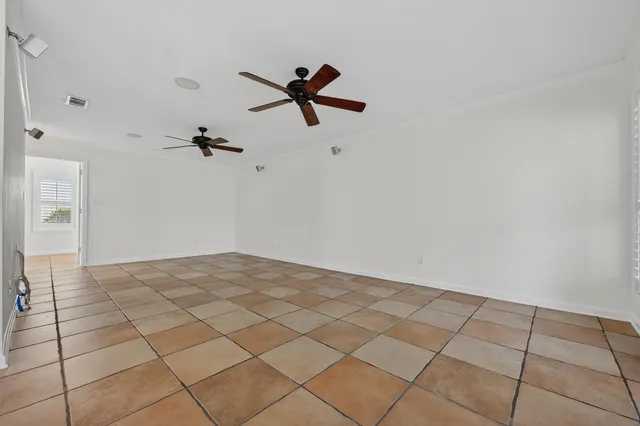a kitchen with stainless steel appliances granite countertop a stove sink and cabinets