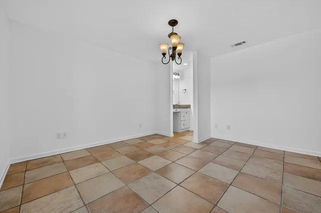 a bathroom with a shower and a toilet