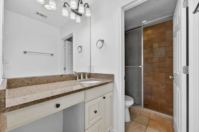a view of a backyard with potted plants