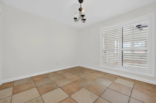 an aerial view of a house with a lake view